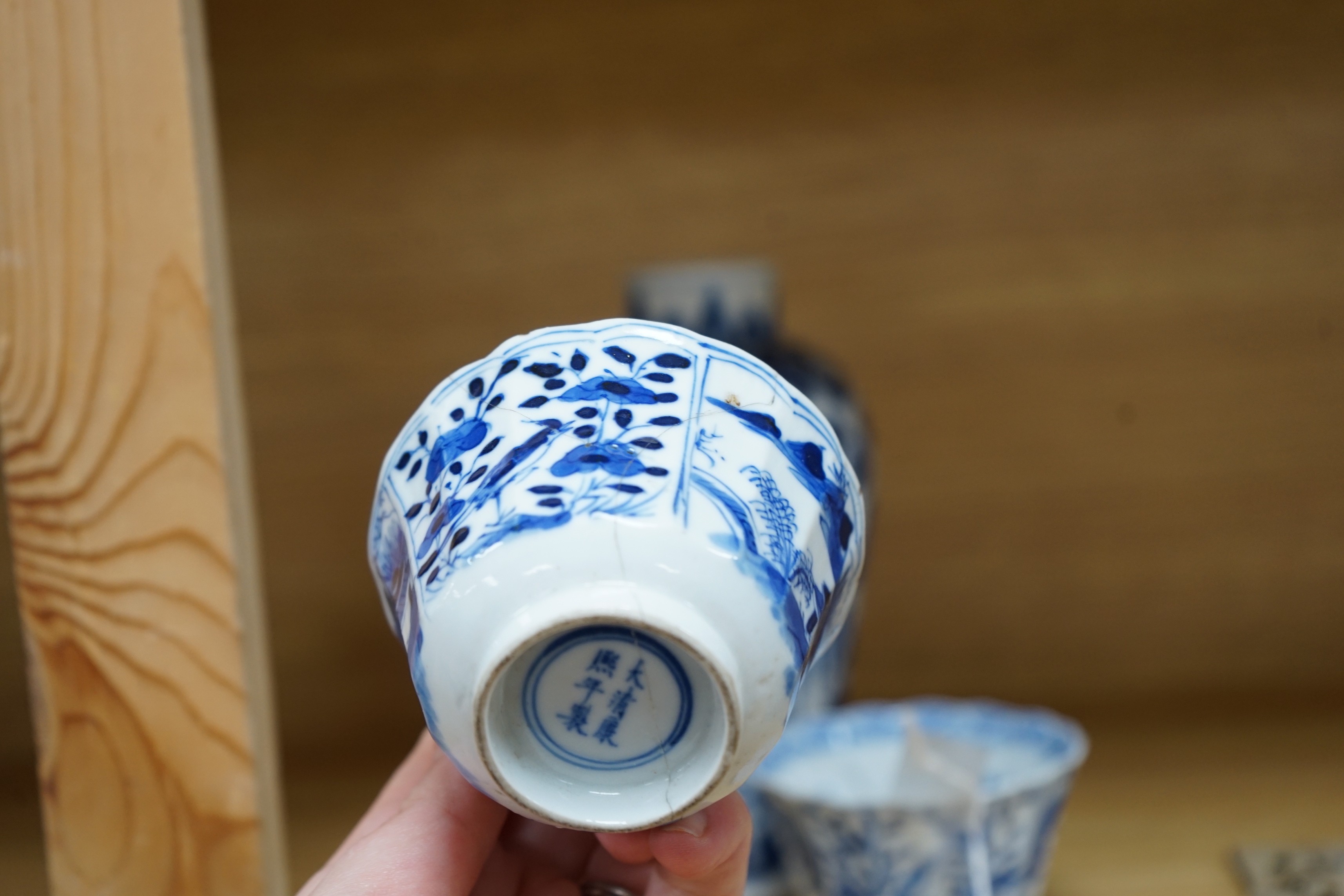A Chinese blue and white phoenix decorated vase, a pair of circular boxes and a pair of damaged tea bowls. Late 19th century Tallest 17.5cm